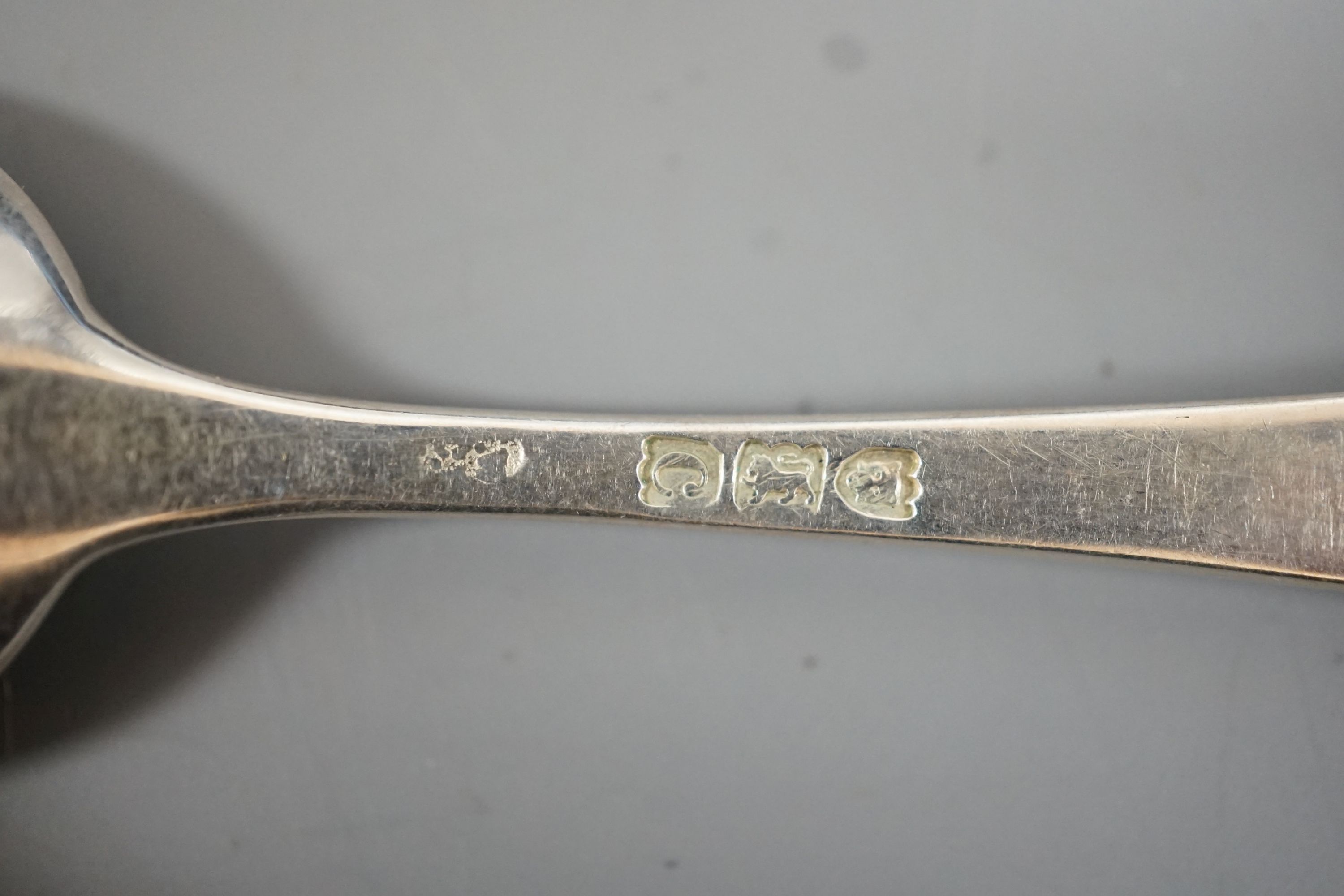 A cased set of six late Victorian silver teaspoons with sugar tongs, London, 1898.